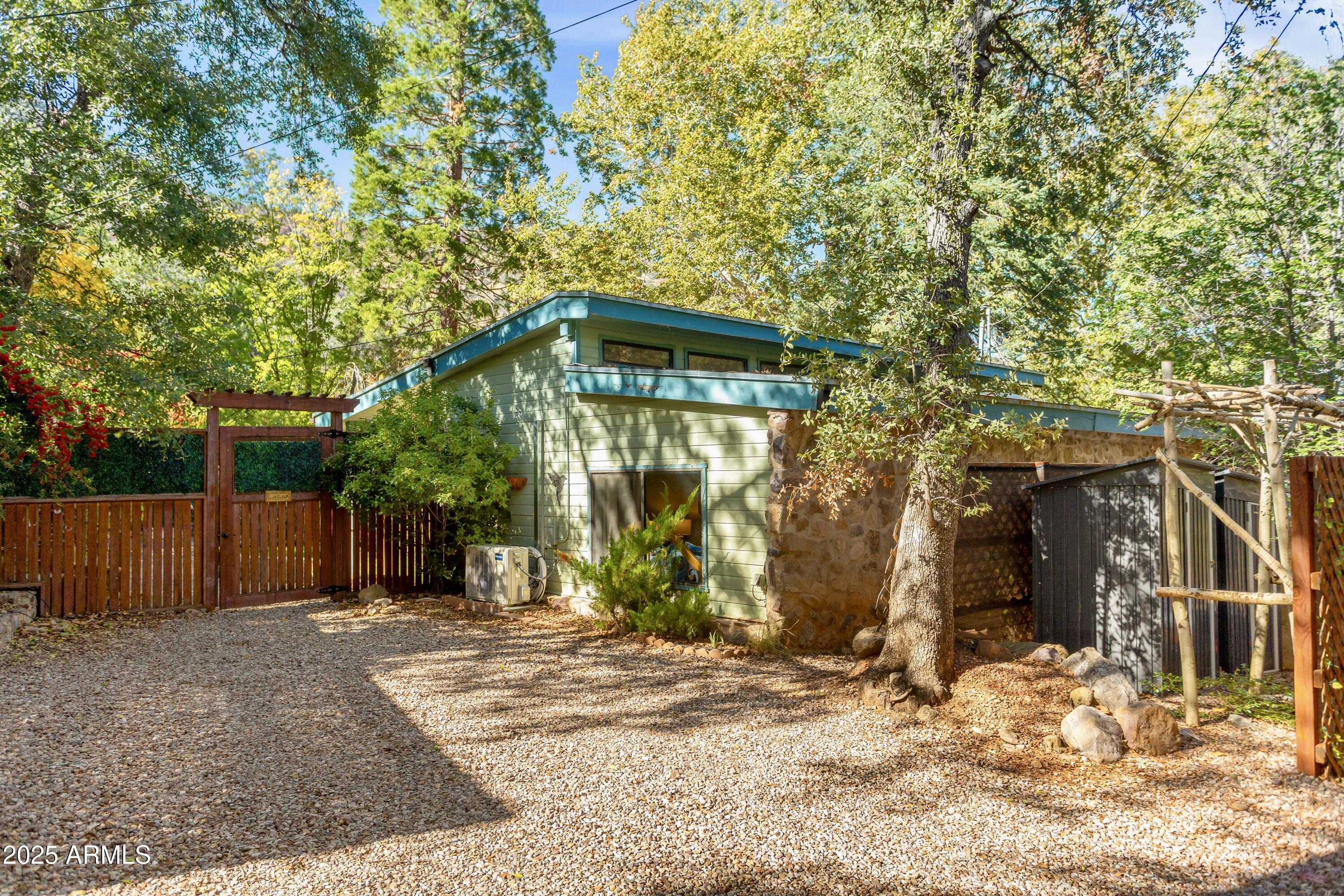 29 East Ramsey Canyon Road Hereford, AZ 85615 - Photo 108 of 119 a front view of a house with a yard