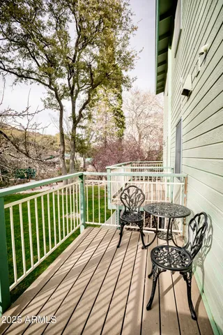a house that has a lot of plants and trees