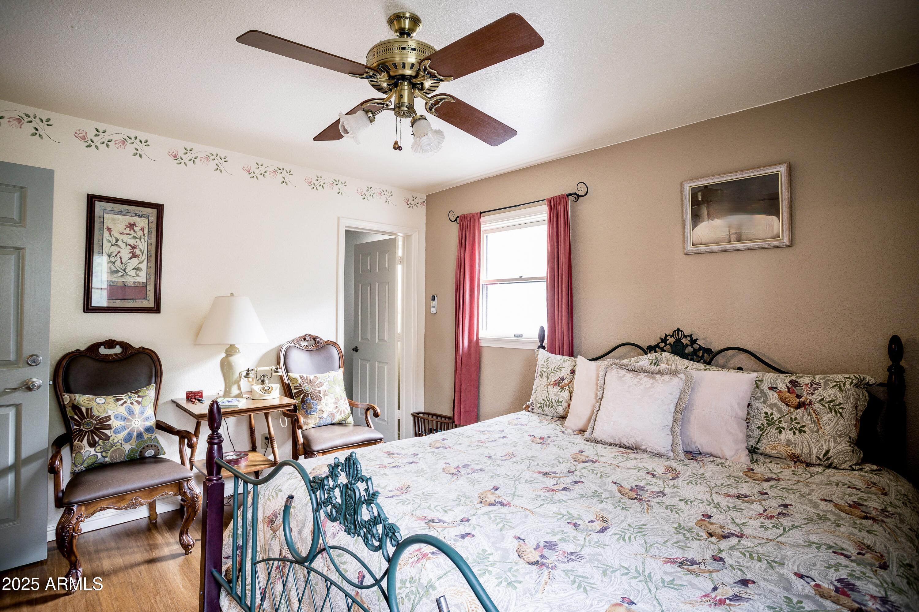 29 East Ramsey Canyon Road Hereford, AZ 85615 - Photo 29 of 119 a bedroom with a bed and ceiling fan