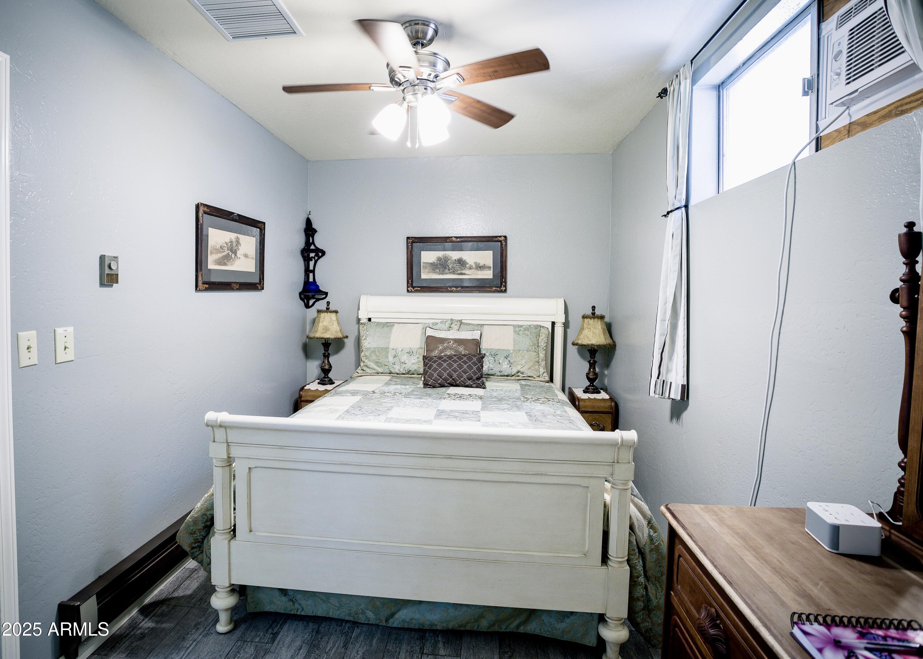 29 East Ramsey Canyon Road Hereford, AZ 85615 - Photo 61 of 119 a bedroom with a bed and a desk
