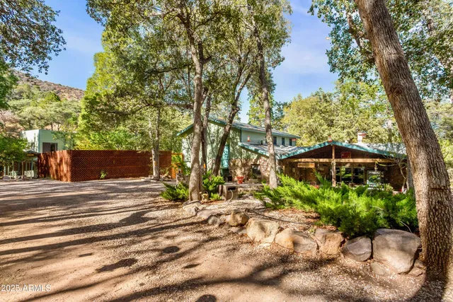 a kitchen with stainless steel appliances a stove and a sink