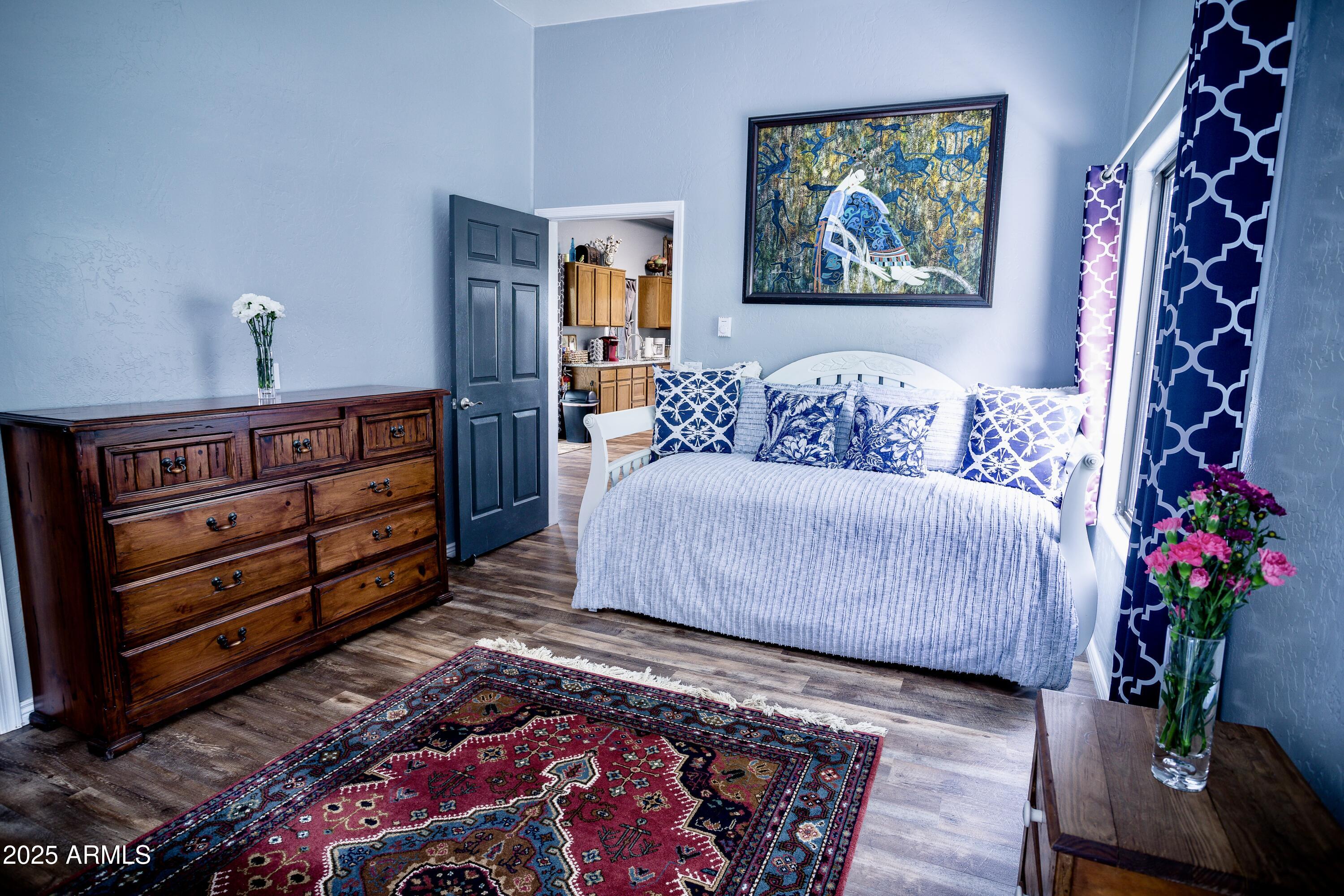 29 East Ramsey Canyon Road Hereford, AZ 85615 - Photo 69 of 119 a living room with furniture and flowers