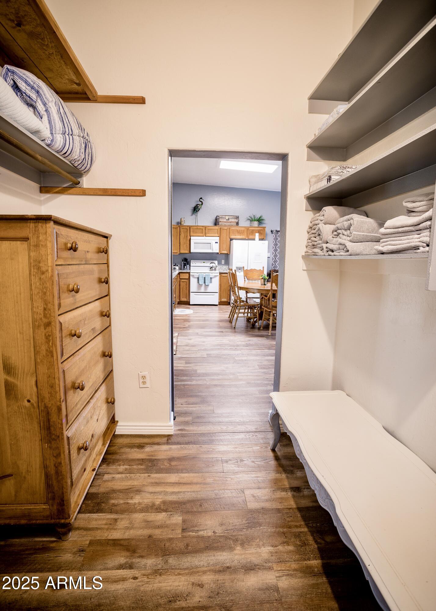 29 East Ramsey Canyon Road Hereford, AZ 85615 - Photo 73 of 119 a view of walk in closet with clothes and shoes