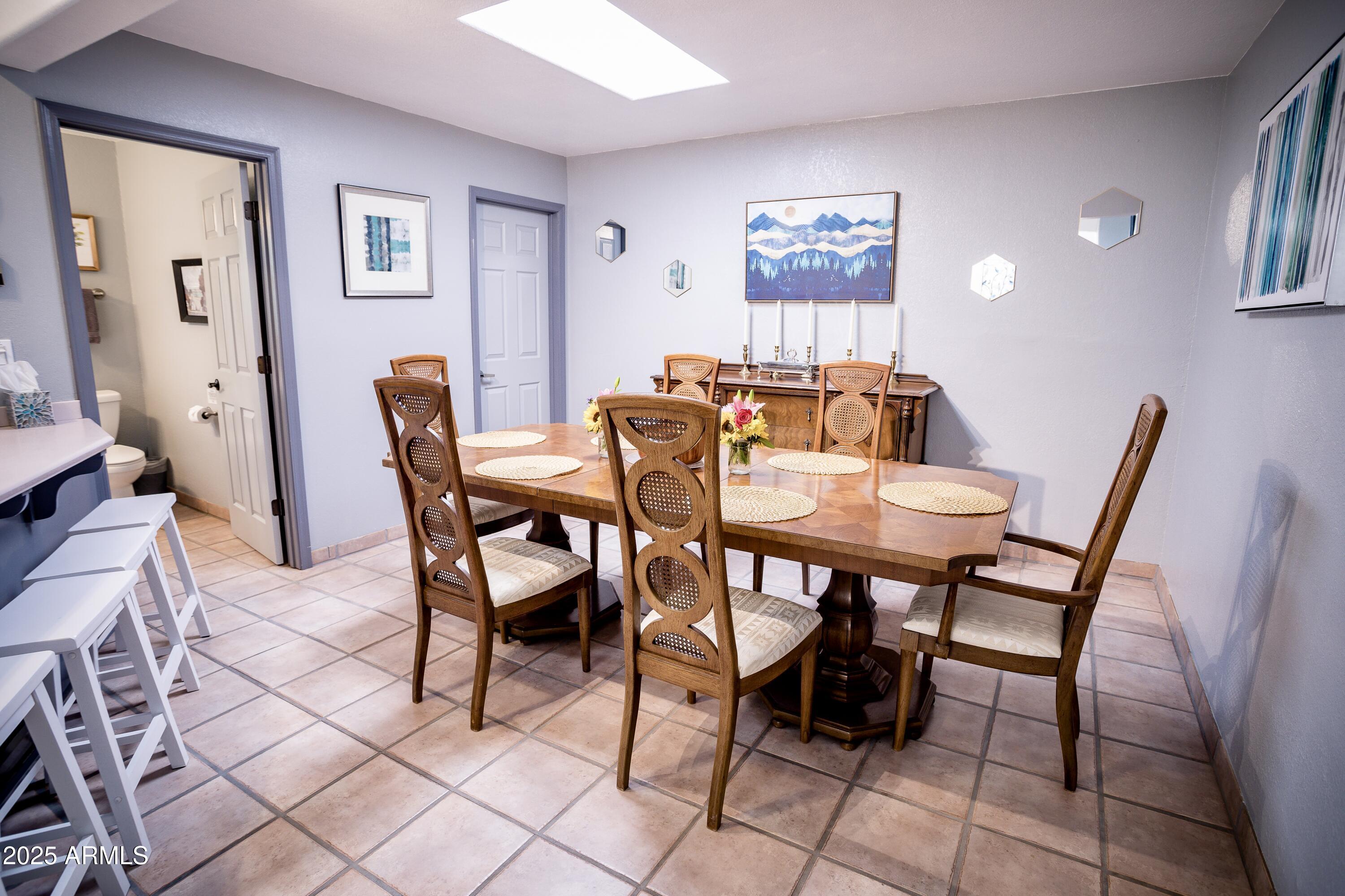 29 East Ramsey Canyon Road Hereford, AZ 85615 - Photo 88 of 119 a view of a dining room and livingroom with furniture