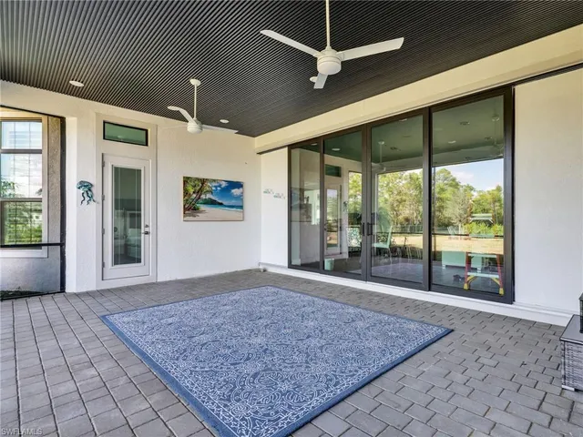 an empty room with floor to ceiling windows and floor to ceiling window