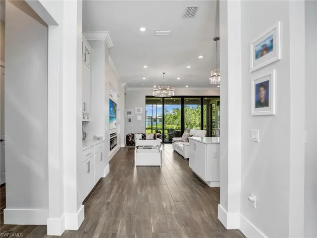 a view of a living room and dining room