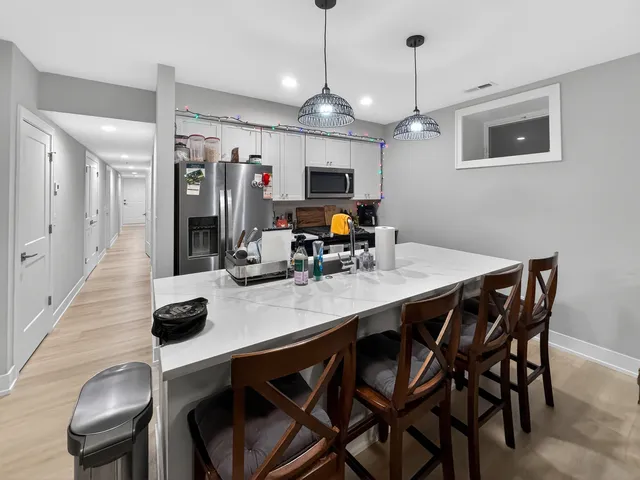 a view of a dining room with furniture