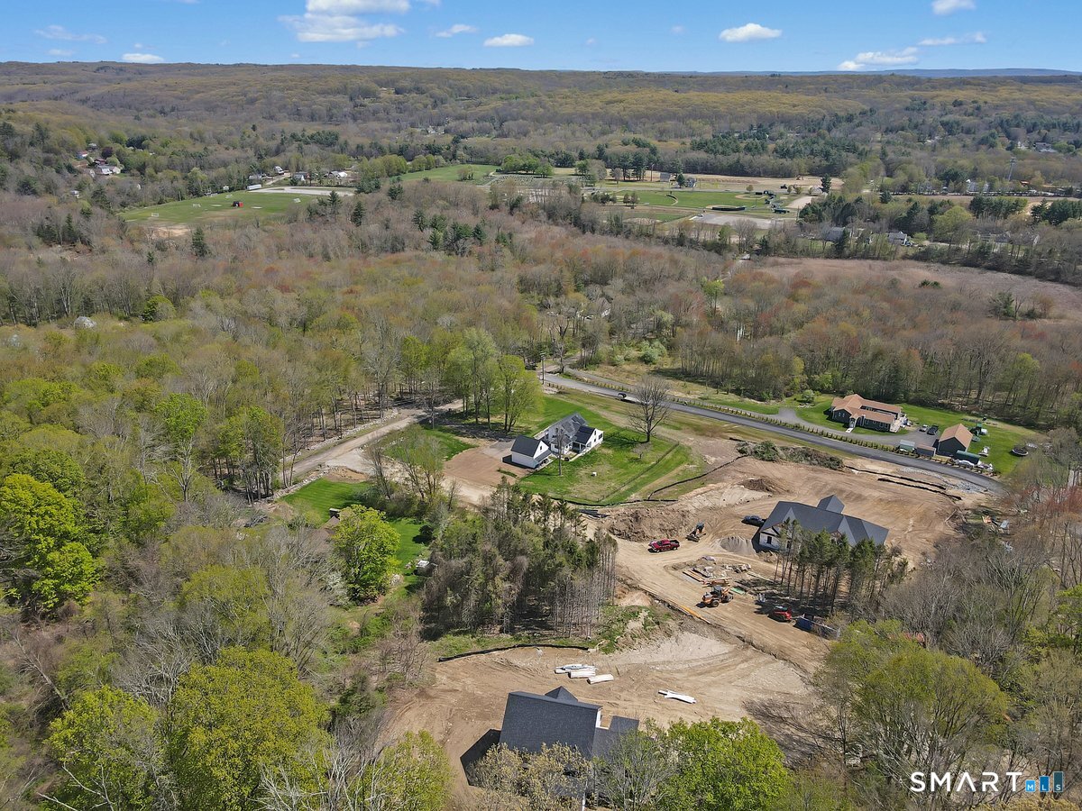 106 South Street Extension Coventry, CT 06238 - Photo 3 of 33 an aerial view of residential house with outdoor space