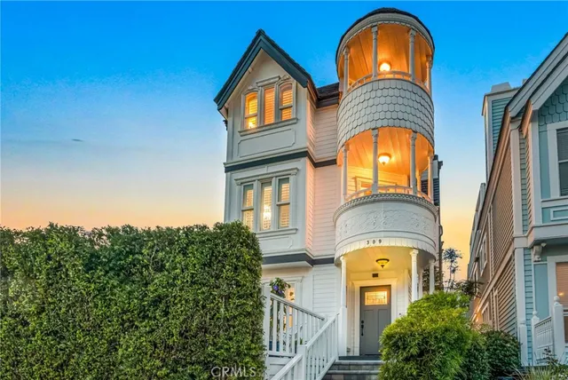 a view of a house with a potted plant and a window