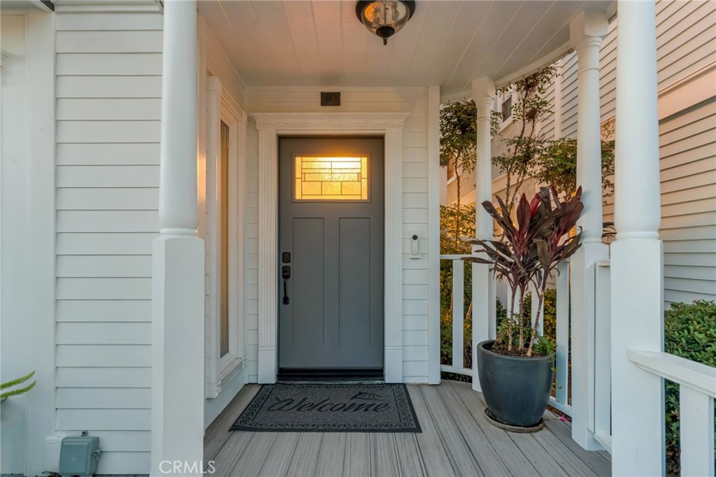 309 21st Street Huntington Beach, CA 92648 - Photo 2 of 38 a view of a house with a potted plant and a window