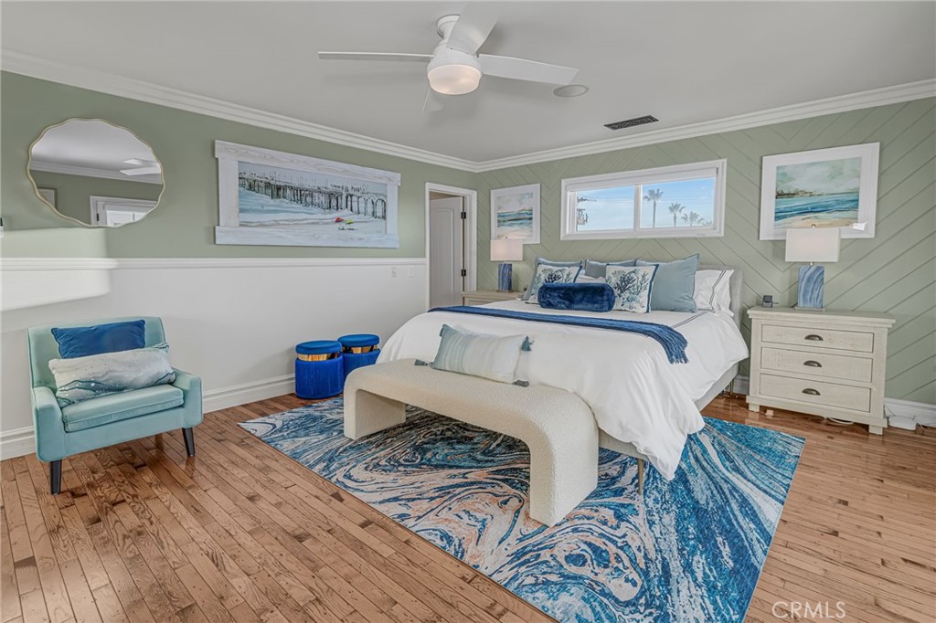 309 21st Street Huntington Beach, CA 92648 - Photo 26 of 38 a room with a bed and a couch