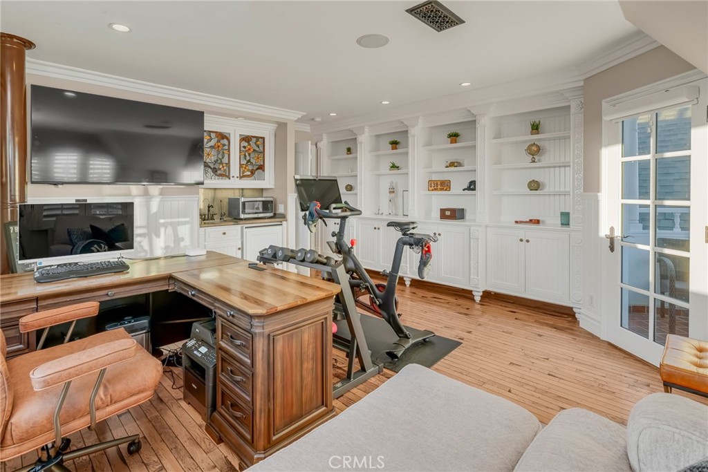 309 21st Street Huntington Beach, CA 92648 - Photo 31 of 38 a open kitchen with stainless steel appliances granite countertop a stove and a sink