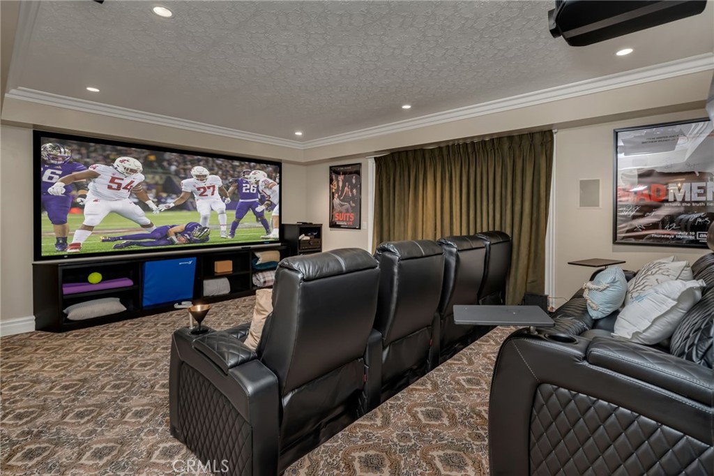 309 21st Street Huntington Beach, CA 92648 - Photo 33 of 38 a living room with furniture and a flat screen tv