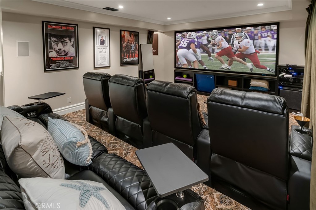 309 21st Street Huntington Beach, CA 92648 - Photo 34 of 38 a living room with furniture and a flat screen tv