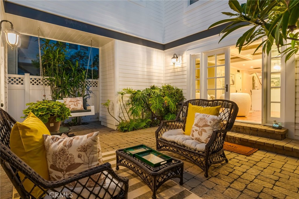 309 21st Street Huntington Beach, CA 92648 - Photo 5 of 38 a outdoor living space with furniture and a potted plant