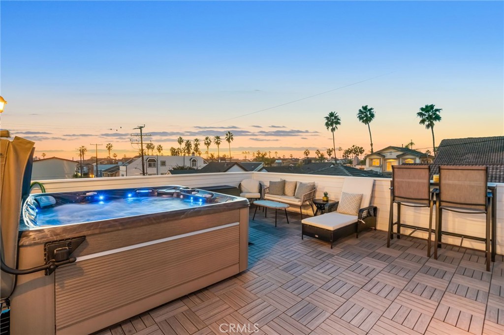 309 21st Street Huntington Beach, CA 92648 - Photo 7 of 38 a view of a terrace with seating area