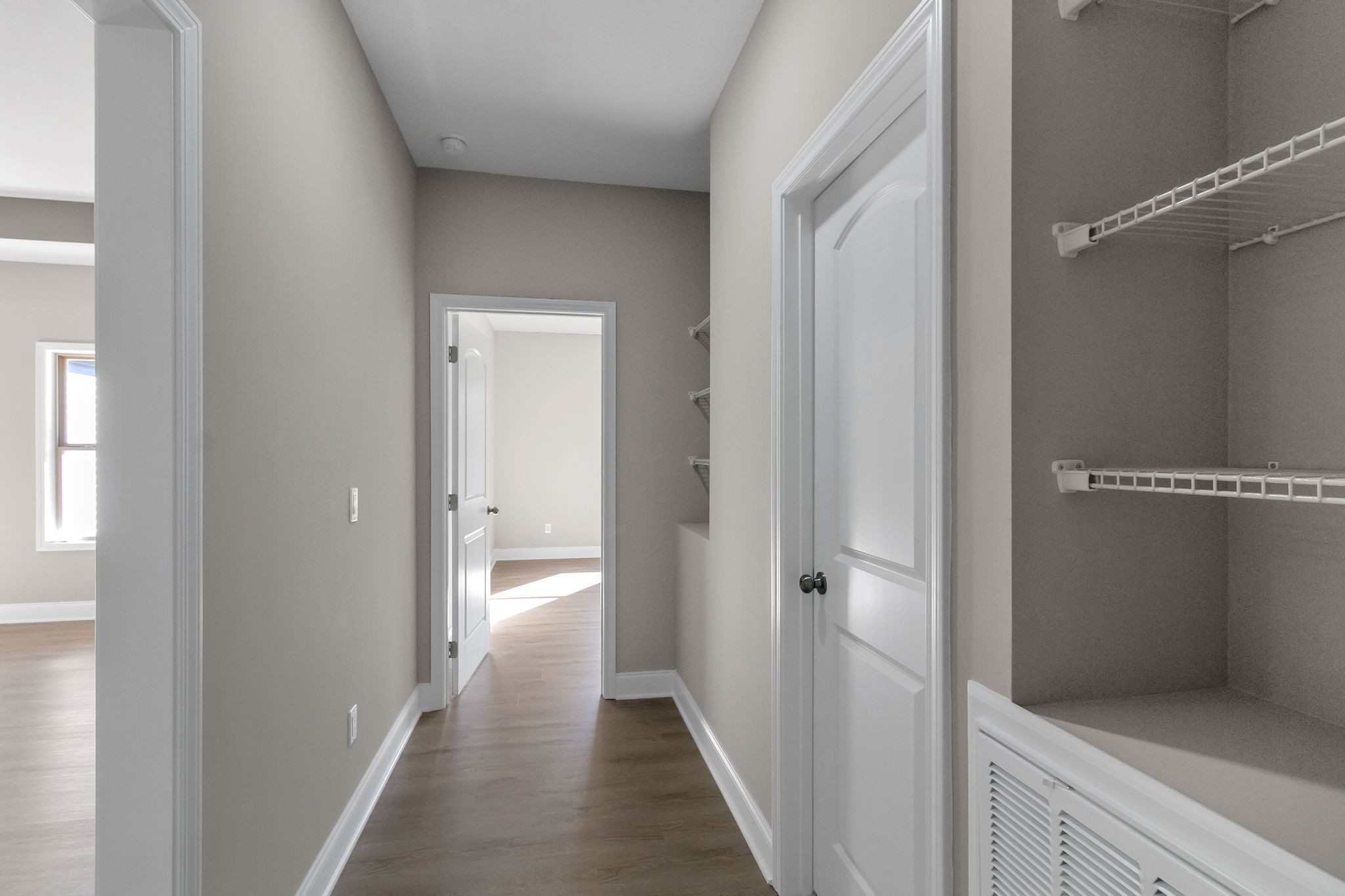 74 Mockingbird Lane Paris, TN 38242 - Photo 17 of 21 a view of a hallway with wooden floor and closet