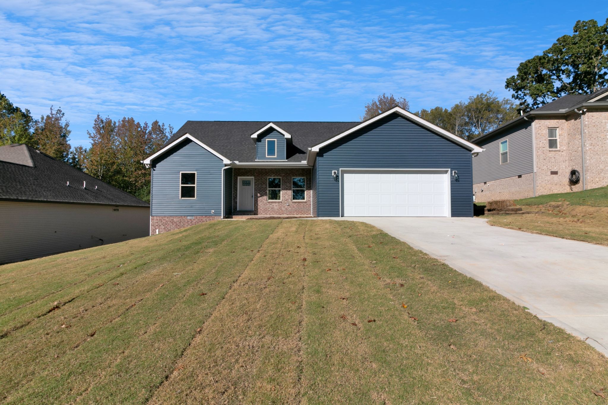 74 Mockingbird Lane Paris, TN 38242 - Photo 21 of 21 a front view of a house with a yard