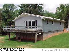 0 Angela Hart Lane Fairview, NC 28730 - Photo 3 of 4 a backyard of a house with table and chairs