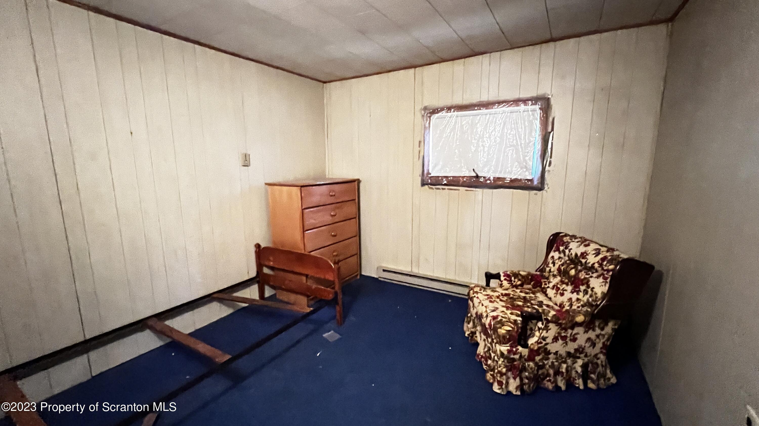 102 Wayne Street Carbondale, PA 18407 - Photo 19 of 21 a room with toys and a wooden table