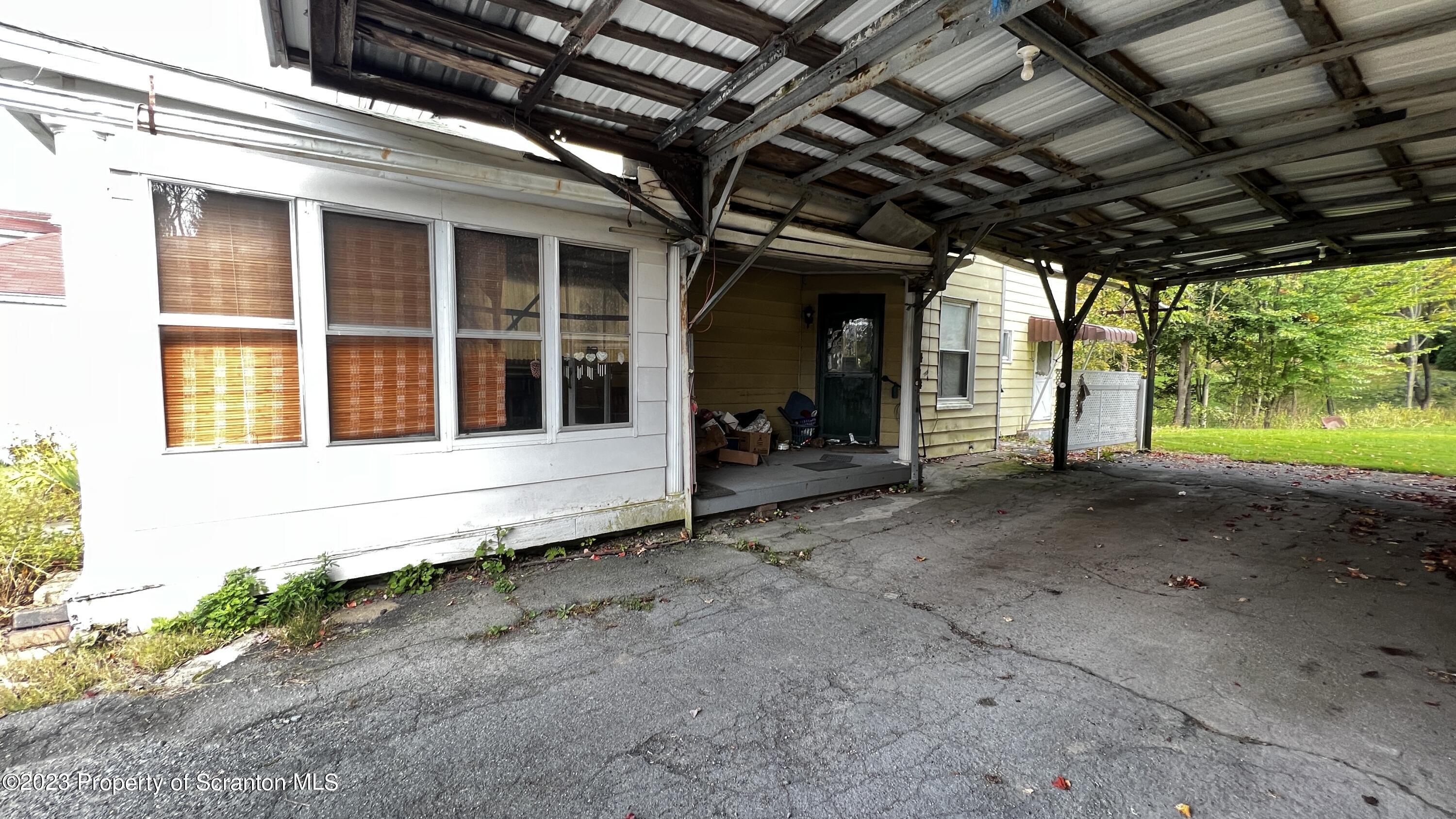 102 Wayne Street Carbondale, PA 18407 - Photo 2 of 21 a view of a house with backyard of house