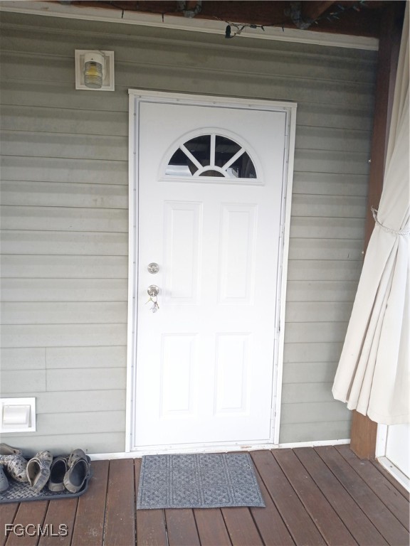 15582 Northwest 316th Street Okeechobee, FL 34972 - Photo 18 of 47 a view of front door
