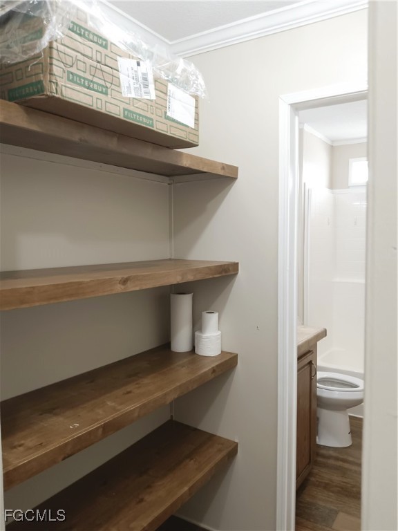 15582 Northwest 316th Street Okeechobee, FL 34972 - Photo 27 of 47 a bathroom with a toilet and a sink