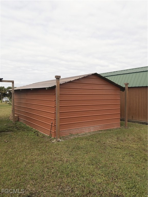 15582 Northwest 316th Street Okeechobee, FL 34972 - Photo 41 of 47 a backyard of a house