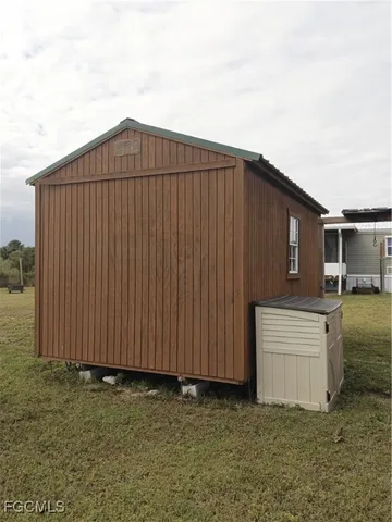 a house view with a backyard space