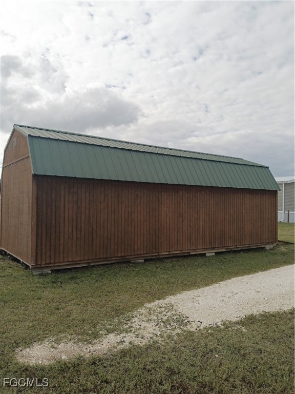 15582 Northwest 316th Street Okeechobee, FL 34972 - Photo 44 of 47 a view of a backyard