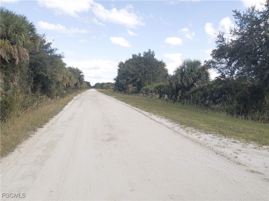 15582 Northwest 316th Street Okeechobee, FL 34972 - Photo 6 of 47 a view of a lake with mountain in the back