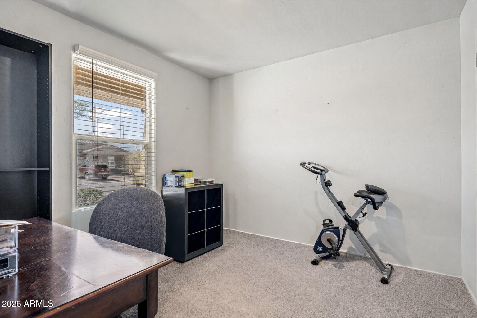 373 Redwood Loop Benson, AZ 85602 - Photo 22 of 29 a view of workspace with a window