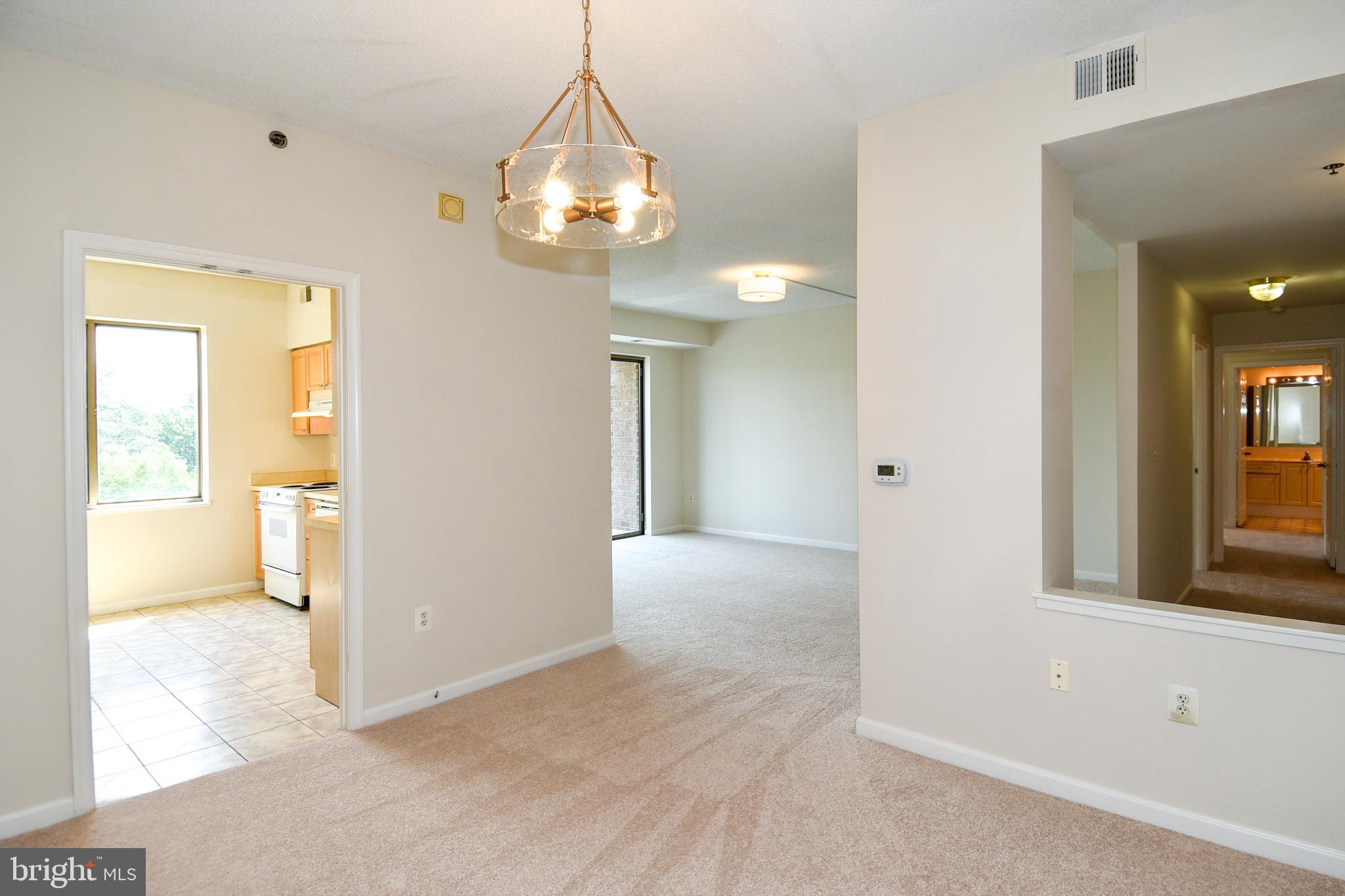 3200 North Leisure World Boulevard, Unit 407 Silver Spring, MD 20906 - Photo 12 of 38 Dining area off kitchen and living room