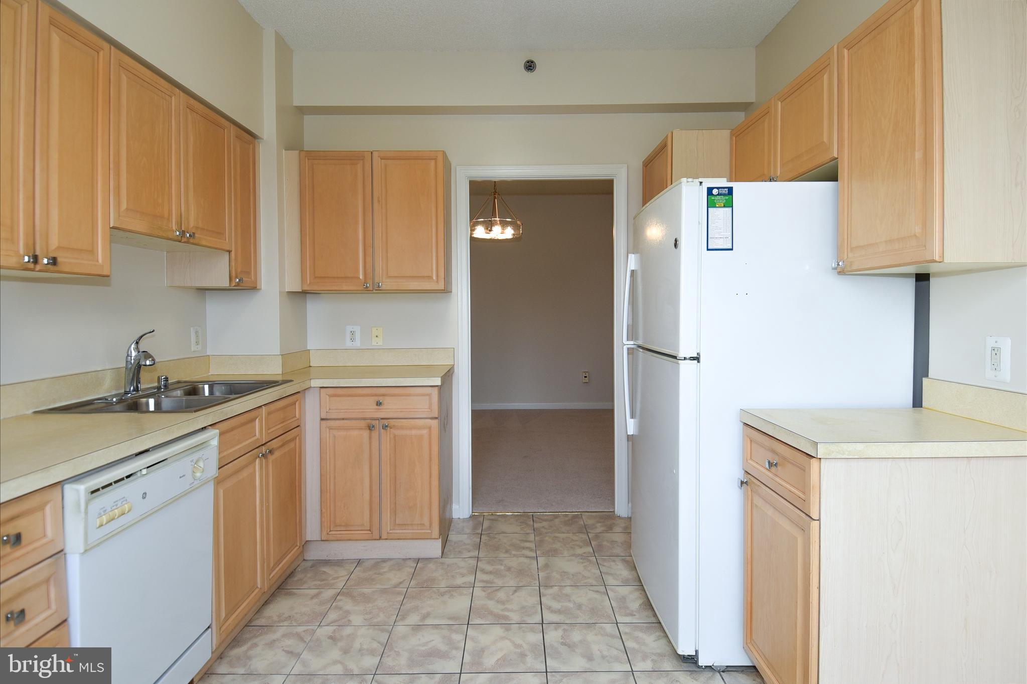 3200 North Leisure World Boulevard, Unit 407 Silver Spring, MD 20906 - Photo 14 of 38 Bright airy kitchen