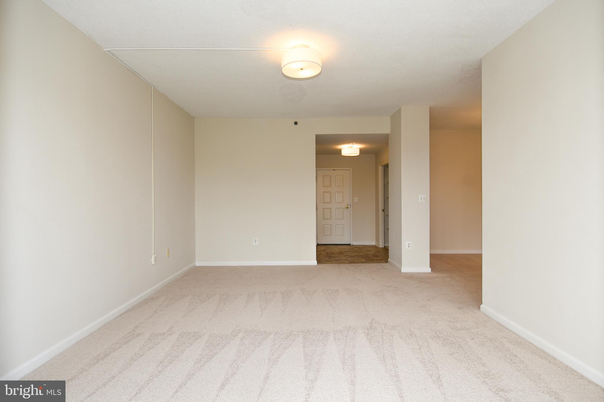 3200 North Leisure World Boulevard, Unit 407 Silver Spring, MD 20906 - Photo 16 of 38 Living room view from balcony