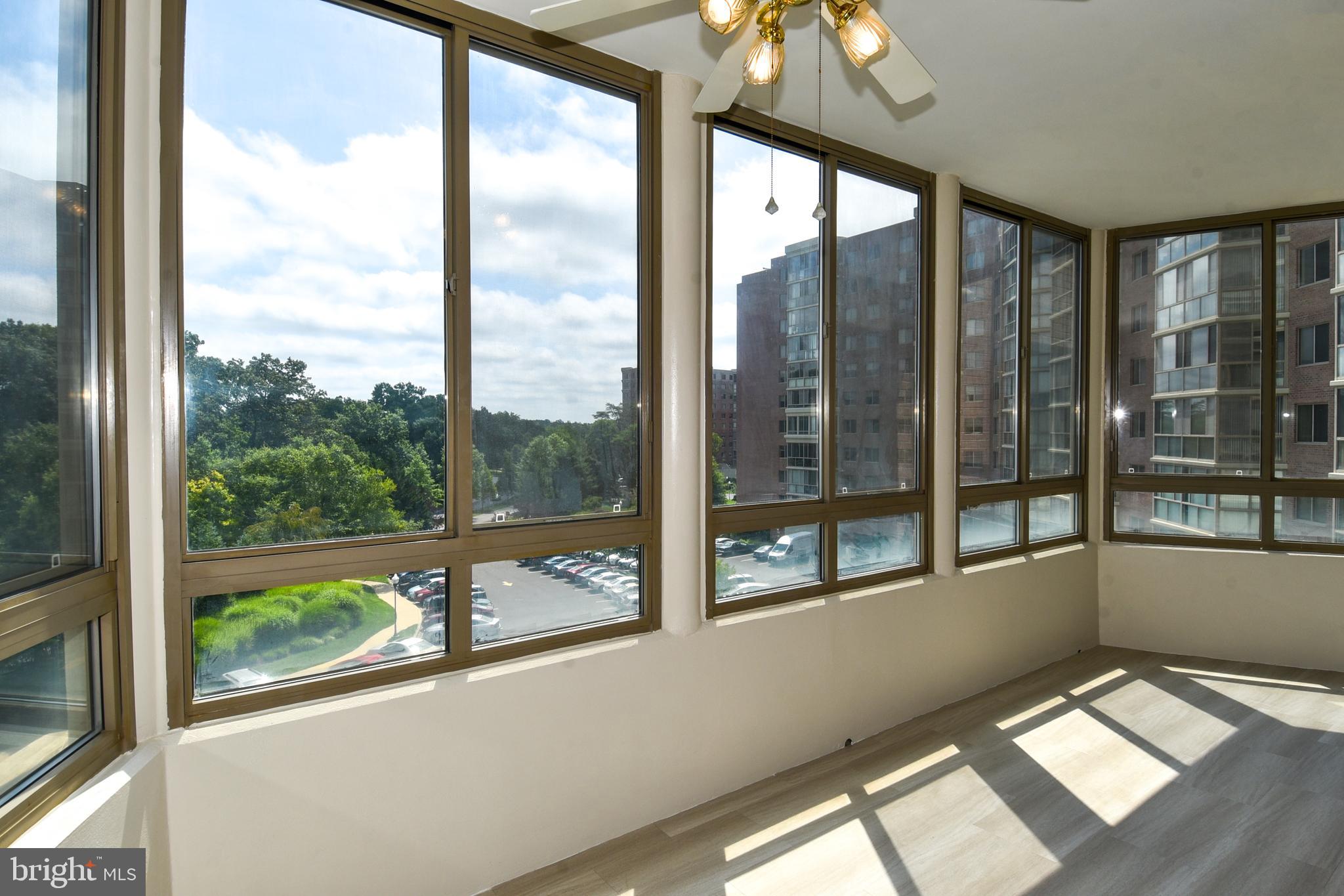 3200 North Leisure World Boulevard, Unit 407 Silver Spring, MD 20906 - Photo 17 of 38 Incredible enclosed balcony