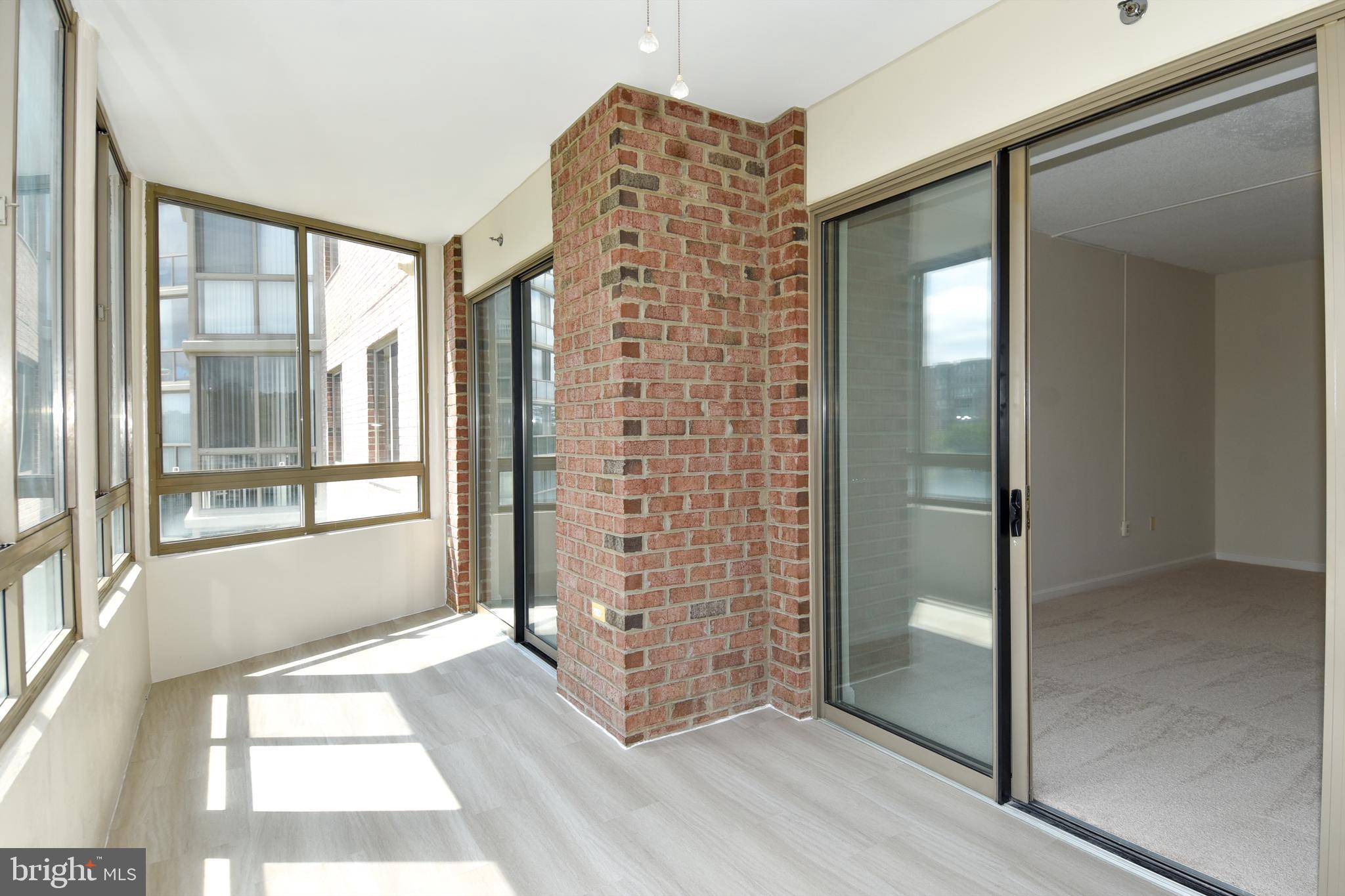 3200 North Leisure World Boulevard, Unit 407 Silver Spring, MD 20906 - Photo 18 of 38 Enclosed balcony