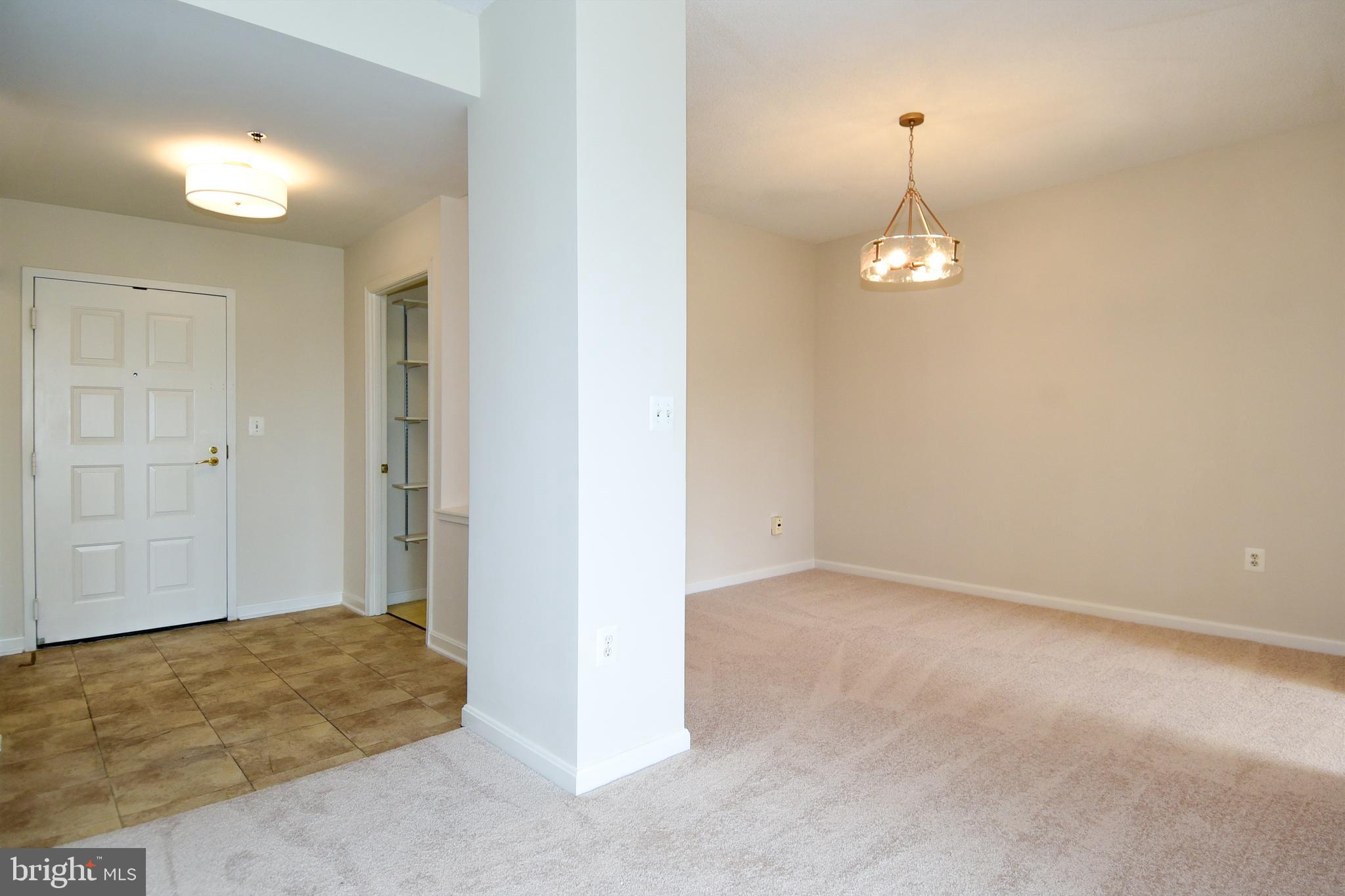 3200 North Leisure World Boulevard, Unit 407 Silver Spring, MD 20906 - Photo 19 of 38 Living room to dining room