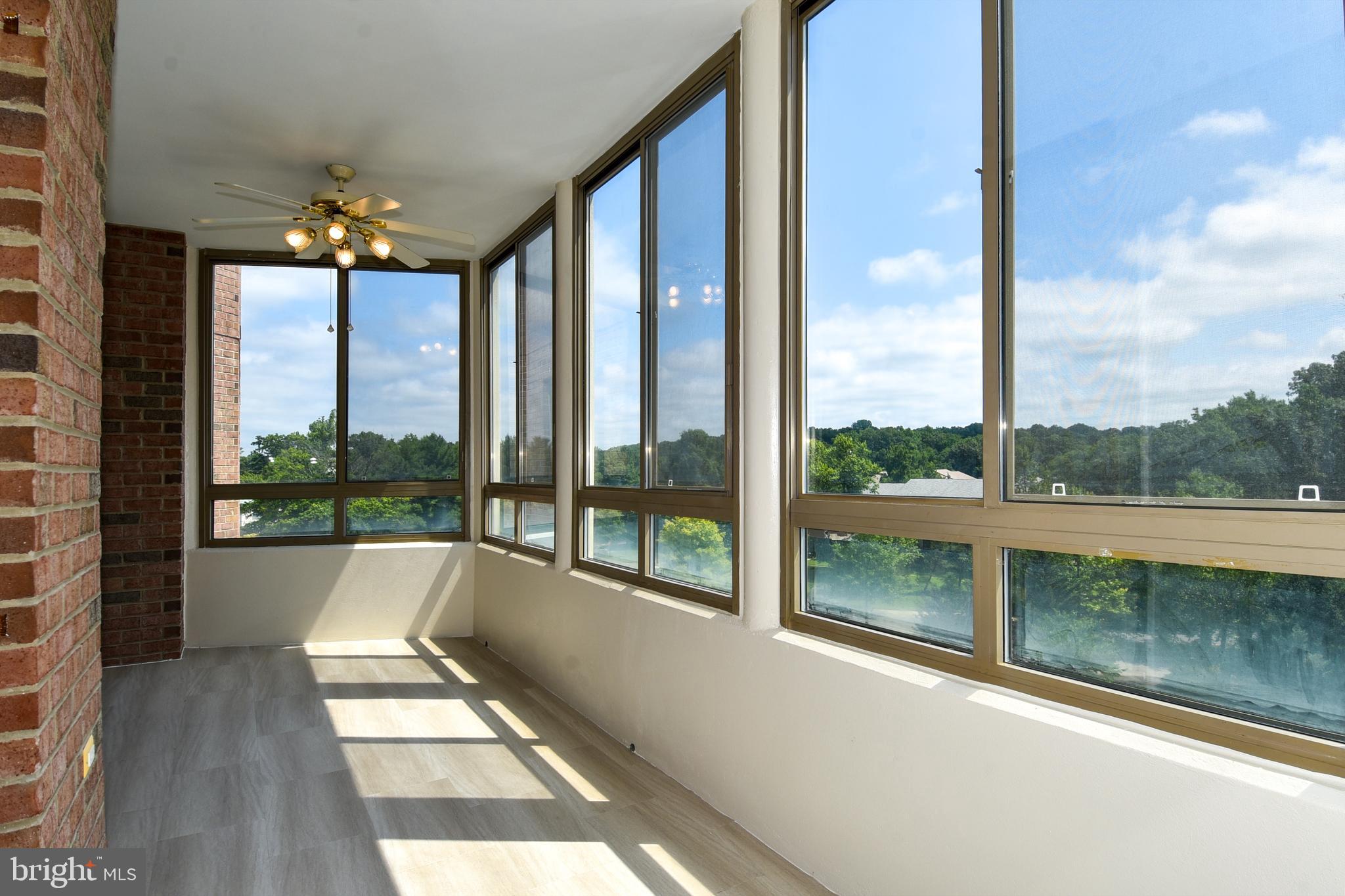 3200 North Leisure World Boulevard, Unit 407 Silver Spring, MD 20906 - Photo 23 of 38 Balcony access from bedroom 2
