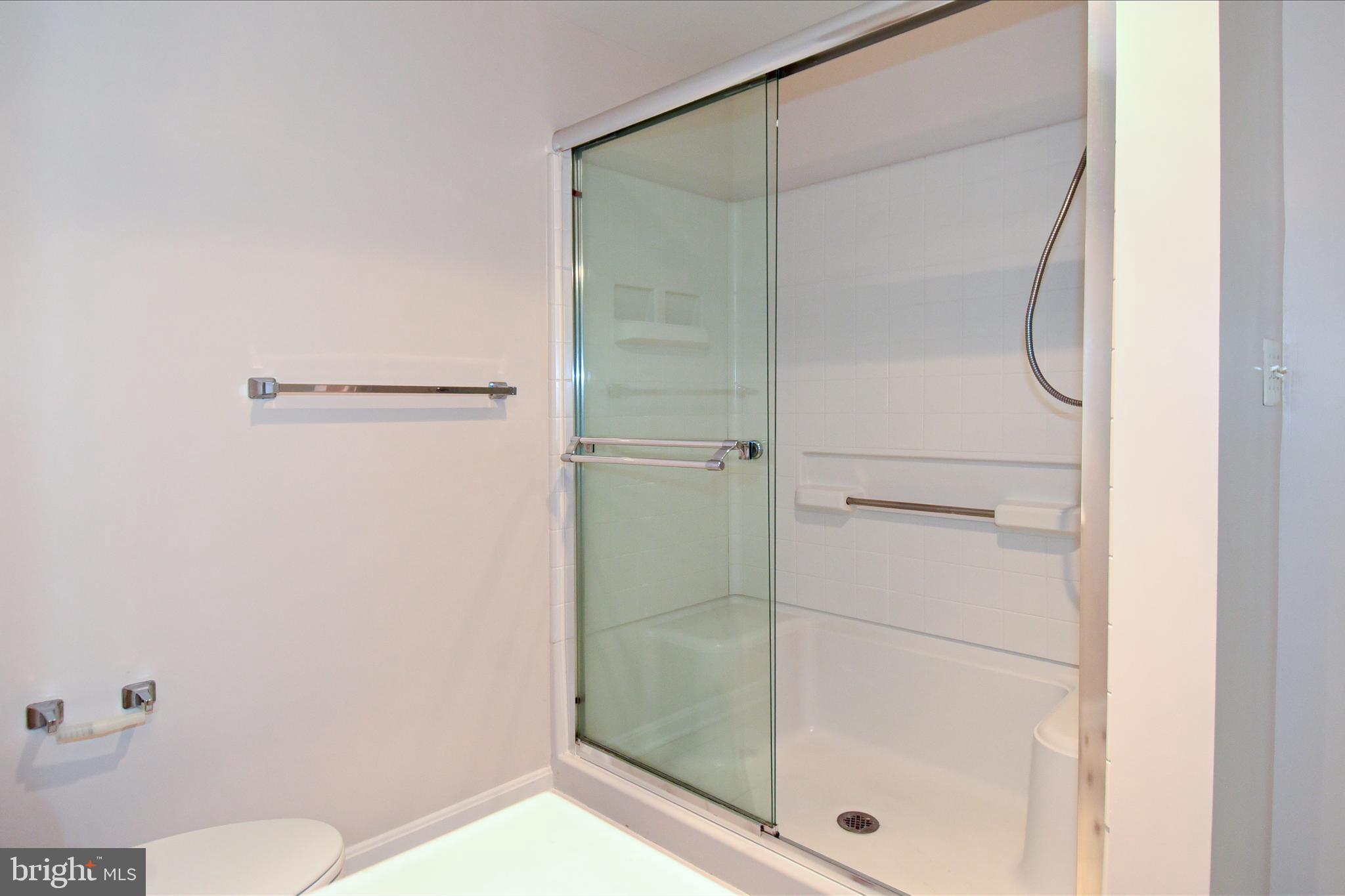 3200 North Leisure World Boulevard, Unit 407 Silver Spring, MD 20906 - Photo 30 of 38 Stall shower in primary bath