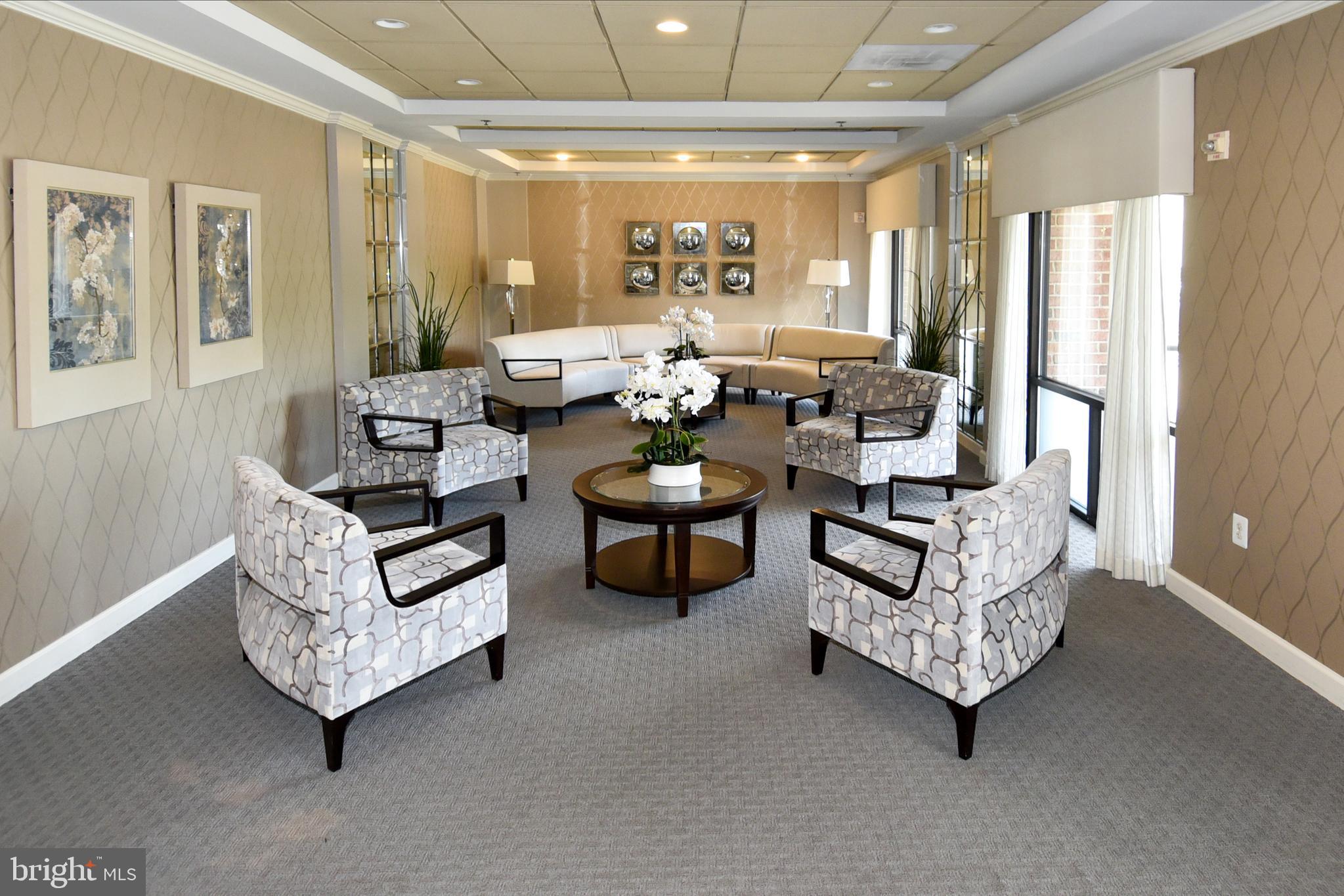 3200 North Leisure World Boulevard, Unit 407 Silver Spring, MD 20906 - Photo 33 of 38 Inviting Lobby Area