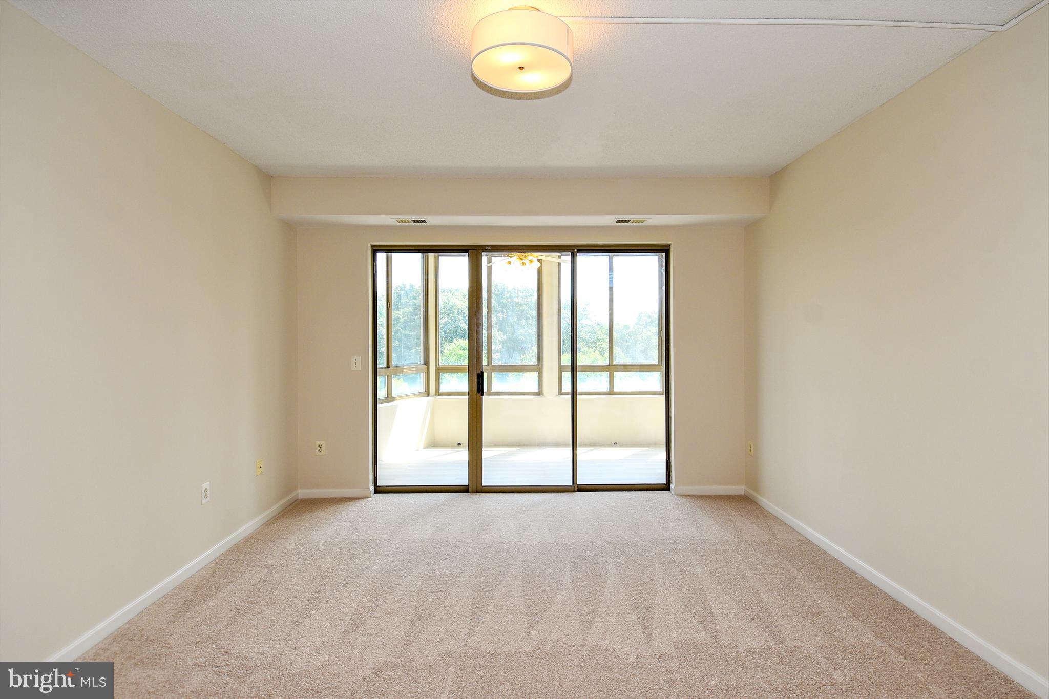 3200 North Leisure World Boulevard, Unit 407 Silver Spring, MD 20906 - Photo 10 of 38 Living room from foyer