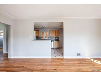a view of an empty room and window