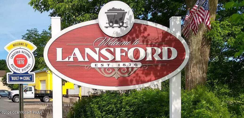 448 East Kline Avenue Lansford, PA 18232 - Photo 11 of 14 a sign that is on a pole