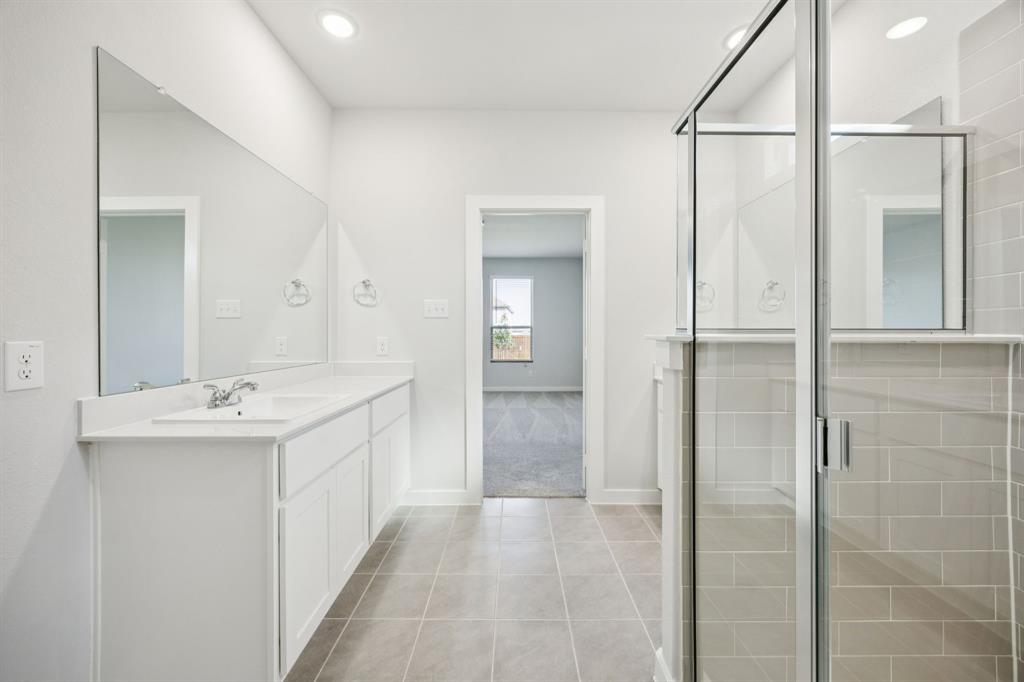 2313 Wind River Road Princeton, TX 75407 - Photo 21 of 35 Primary Bathroom in the Masters home plan by Trophy Signature Homes – REPRESENTATIVE PHOTO