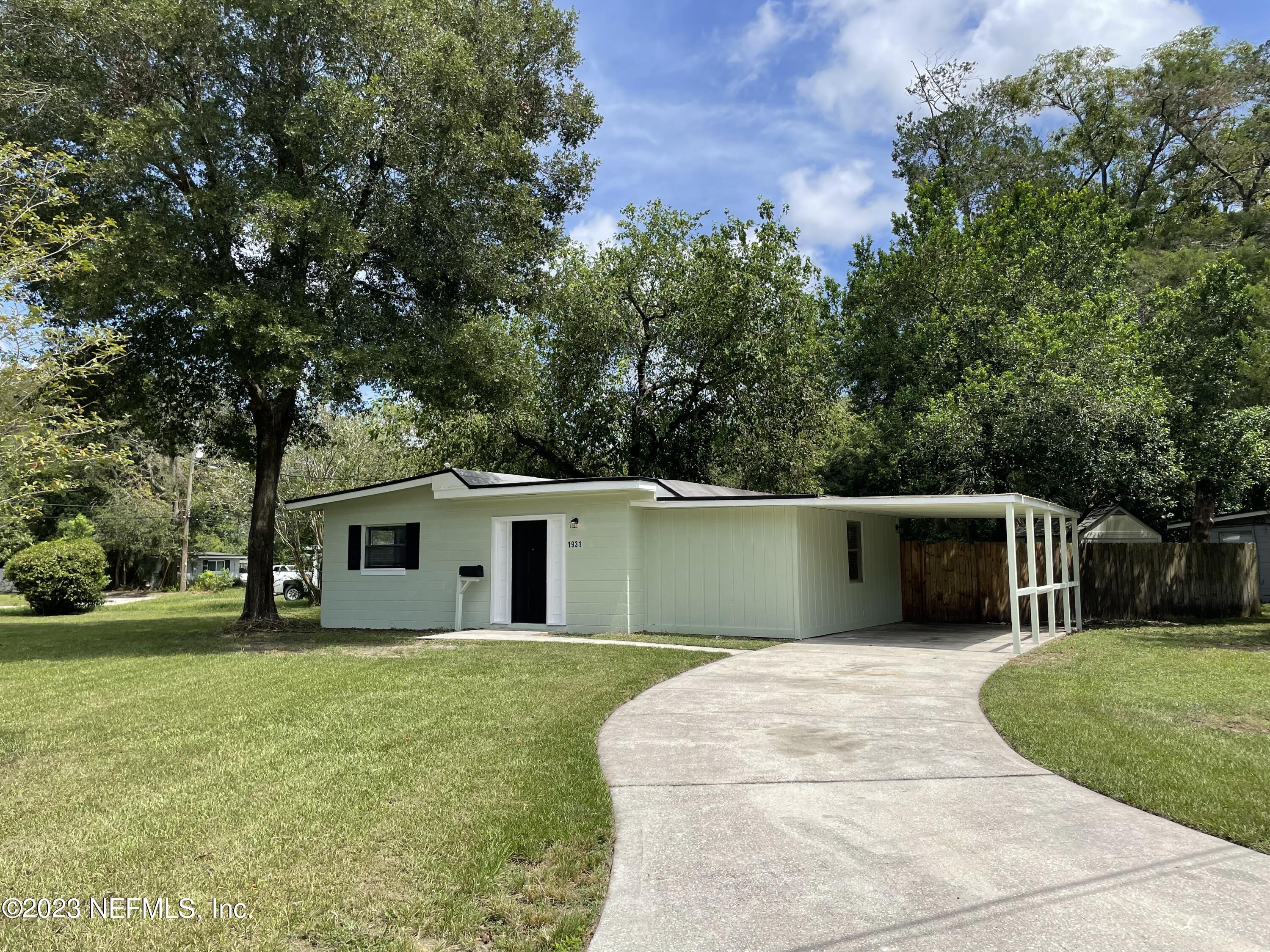 1931 Griflet Road Jacksonville, FL 32211 - Photo 1 of 29 a view of a house with a backyard