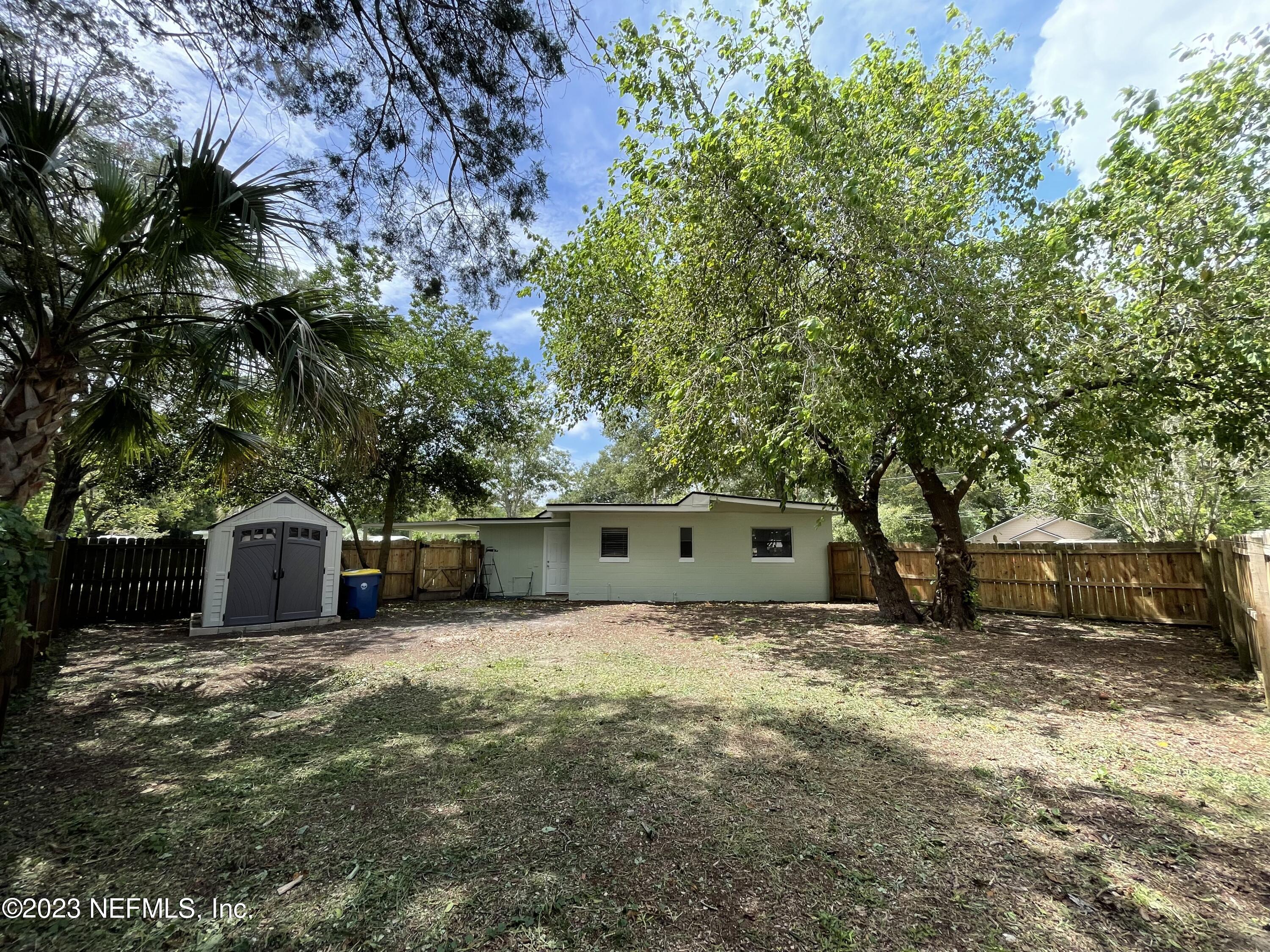 1931 Griflet Road Jacksonville, FL 32211 - Photo 21 of 29 a view of a house with a yard