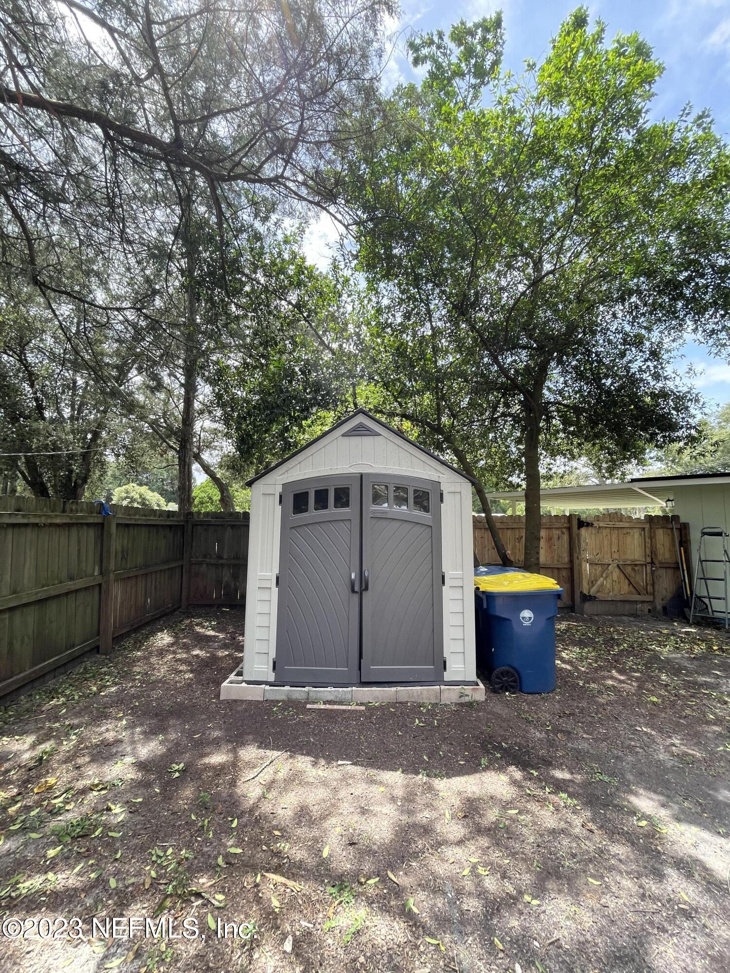 1931 Griflet Road Jacksonville, FL 32211 - Photo 22 of 29 a view of backyard space and wooden fence