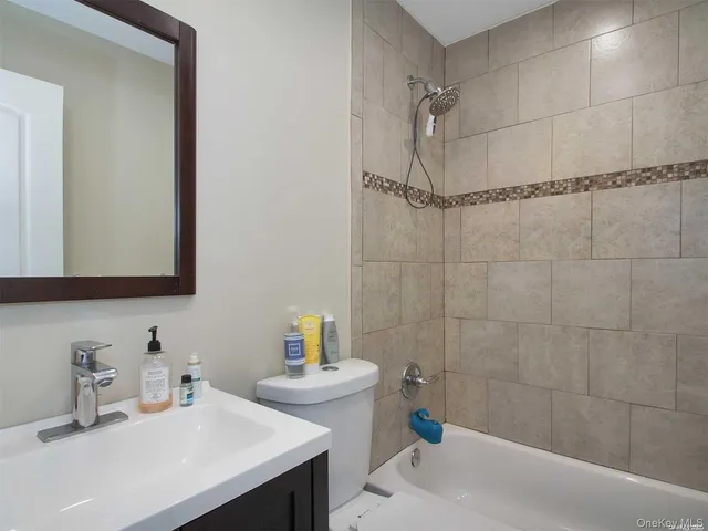 a bathroom with a sink and a shower