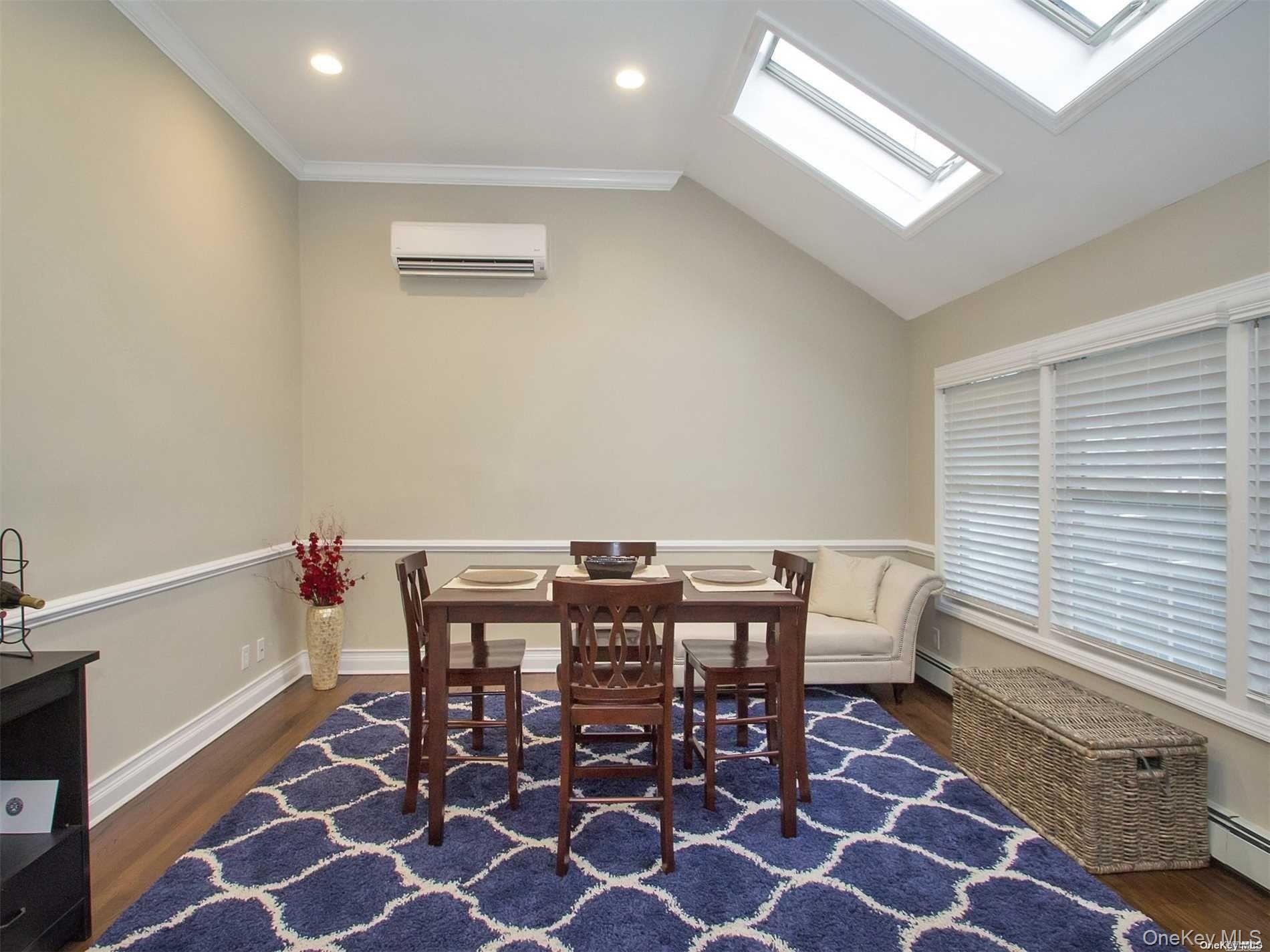11 Pratt Street West Babylon, NY 11704 - Photo 5 of 15 a view of a dining room with furniture and rug